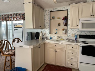 Furnished Park Model with addition, RV hookups and newer golf - photo 10