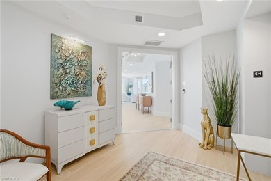 Welcome to an expansive fourth-floor residence in Seaglass at