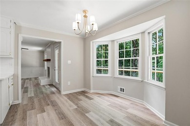 Fully renovated ranch home on a fenced private acre in one of - photo 11