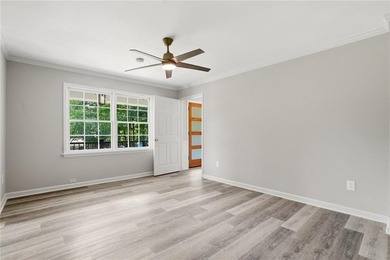 Fully renovated ranch home on a fenced private acre in one of - photo 13