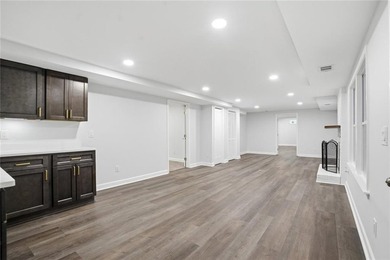 Fully renovated ranch home on a fenced private acre in one of - photo 18