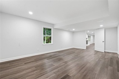 Fully renovated ranch home on a fenced private acre in one of - photo 20
