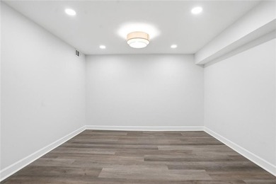 Fully renovated ranch home on a fenced private acre in one of - photo 21