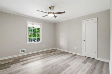 Fully renovated ranch home on a fenced private acre in one of - photo 24