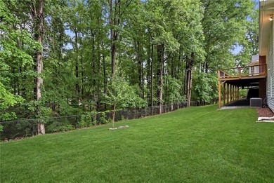 Fully renovated ranch home on a fenced private acre in one of - photo 28