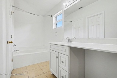 Check out this 3-bedroom, 2-bath home offers a spacious and airy - photo 8