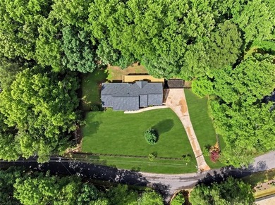 Fully renovated ranch home on a fenced private acre in one of - photo 29