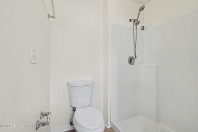Check out this 3-bedroom, 2-bath home offers a spacious and airy - photo 9