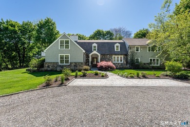 Beautifully updated 4/5 bedroom 4 1/2 bath residence offering a - photo 1