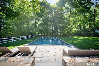 Beautifully updated 4/5 bedroom 4 1/2 bath residence offering a - photo 5
