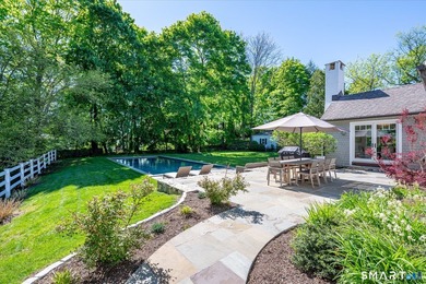 Beautifully updated 4/5 bedroom 4 1/2 bath residence offering a - photo 6
