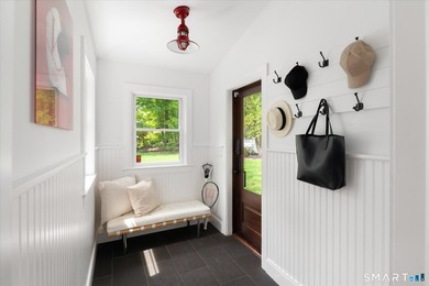 Beautifully updated 4/5 bedroom 4 1/2 bath residence offering a - photo 7