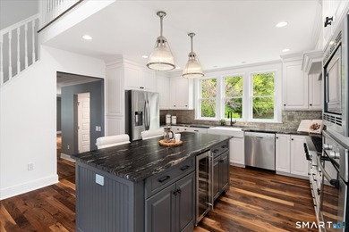 Beautifully updated 4/5 bedroom 4 1/2 bath residence offering a - photo 8