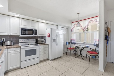Welcome to this exceptional 3-bed, 2-bath condo in a highly - photo 3