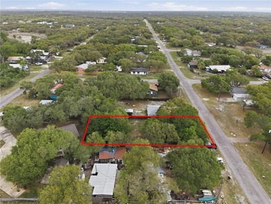 This 0.19-acre unrestricted lot offers a beautiful shaded - photo 4