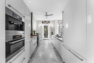 Step inside this sunny, light-filled Charleston masterpiece--a - photo 16