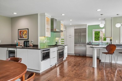 Renovated Lannon stone ranch expertly blends MCM DNA w/ - photo 17