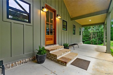 Experience lakefront luxury in this stunning new construction on - photo 9