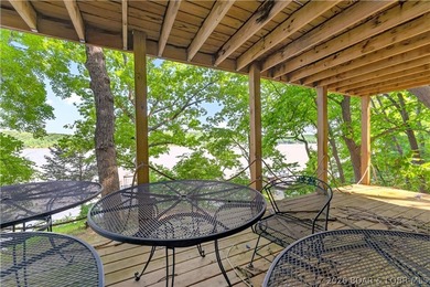 Tucked away on 2.33 lakefront acres, 33400 Kings Way Road offers - photo 11