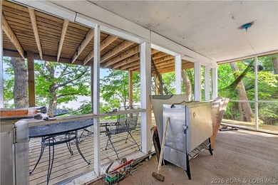Tucked away on 2.33 lakefront acres, 33400 Kings Way Road offers - photo 12