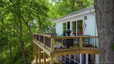 Tucked away on 2.33 lakefront acres, 33400 Kings Way Road offers - photo 15