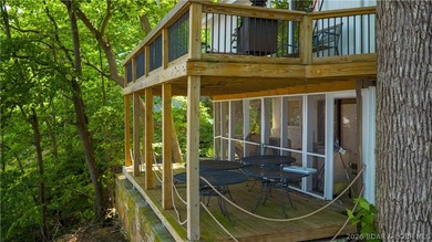 Tucked away on 2.33 lakefront acres, 33400 Kings Way Road offers - photo 16