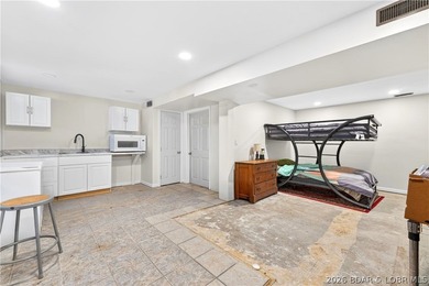 Tucked away on 2.33 lakefront acres, 33400 Kings Way Road offers - photo 17
