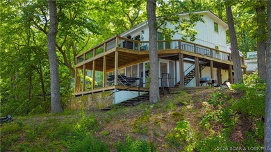 Tucked away on 2.33 lakefront acres, 33400 Kings Way Road offers - photo 20