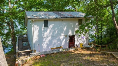 Tucked away on 2.33 lakefront acres, 33400 Kings Way Road offers - photo 21