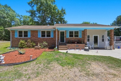 Located just 15 minutes from Ocean Isle Beach, this Shallotte - photo 1
