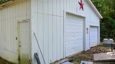 Tucked away on 2.33 lakefront acres, 33400 Kings Way Road offers - photo 22