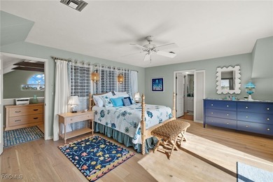 This raised 3-bedroom, 2-bath lake-view home in the popular Gulf