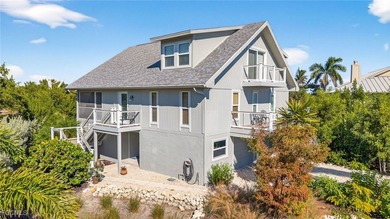 This raised 3-bedroom, 2-bath lake-view home in the popular Gulf