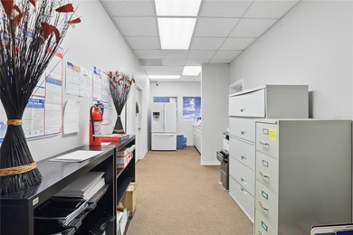 STRONG INVESTMENT OPPORTUNITY WITH 5+ PT CAP RATE. Discover an - photo 28
