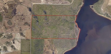 This exceptional waterfront property on East Bay offers - photo 6