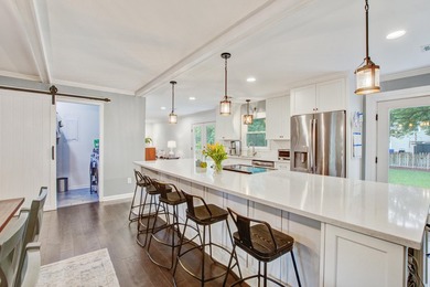 Lovingly updated with a fresh coastal-inspired aesthetic, this - photo 15