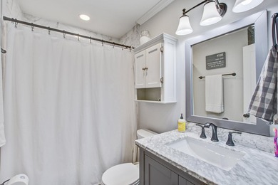 Lovingly updated with a fresh coastal-inspired aesthetic, this - photo 24