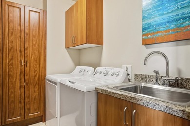 Welcome to this stunning top-floor oceanfront residence in the - photo 24