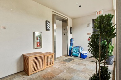 Welcome to this stunning top-floor oceanfront residence in the - photo 27