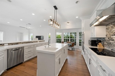 Welcome to Golf Brook Drive, an exclusive address within the - photo 28