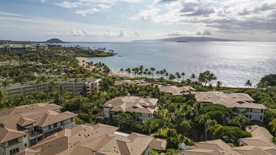 Welcome to this stunning top-floor oceanfront residence in the - photo 30