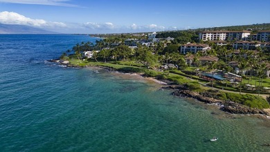 Welcome to this stunning top-floor oceanfront residence in the - photo 32