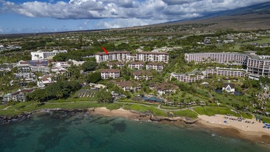 Welcome to this stunning top-floor oceanfront residence in the - photo 36