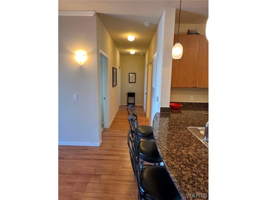 Top floor condo with awesome view of the city & retail area! - photo 6