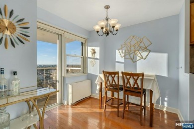 Live above it all in this 21st-floor corner residence with
