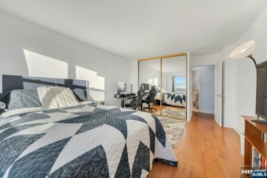 Live above it all in this 21st-floor corner residence with