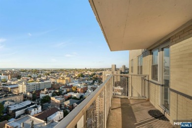 Live above it all in this 21st-floor corner residence with