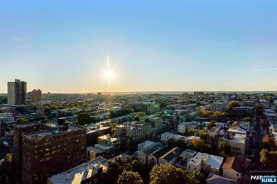 Live above it all in this 21st-floor corner residence with