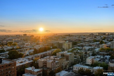 Live above it all in this 21st-floor corner residence with