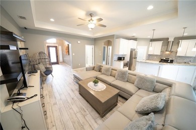 Exquisite 4 bedroom, 3 bath home with a 2 car garage, featuring - photo 3